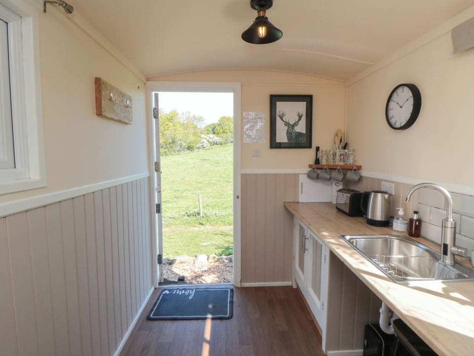 Fridge, microwave, toaster, cookware/dishes/utensils