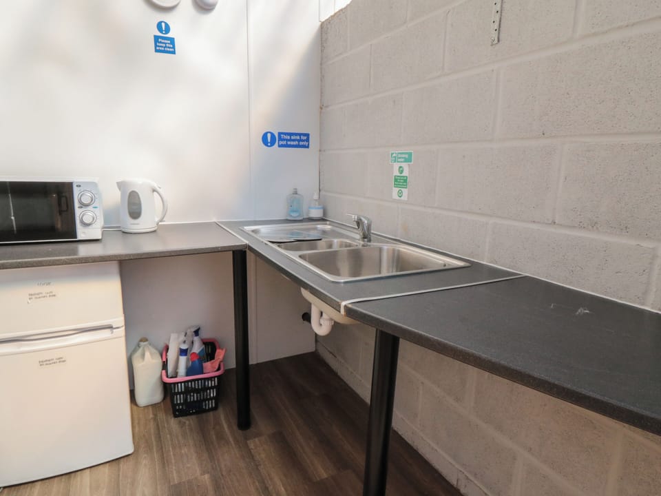 Fridge, microwave, cookware/dishes/utensils