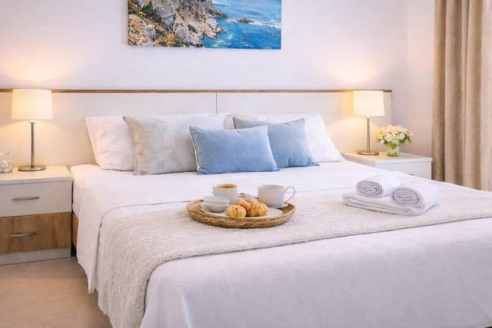 Classic Apartment, Kitchenette, Sea View | Desk, laptop workspace, blackout drapes, free WiFi