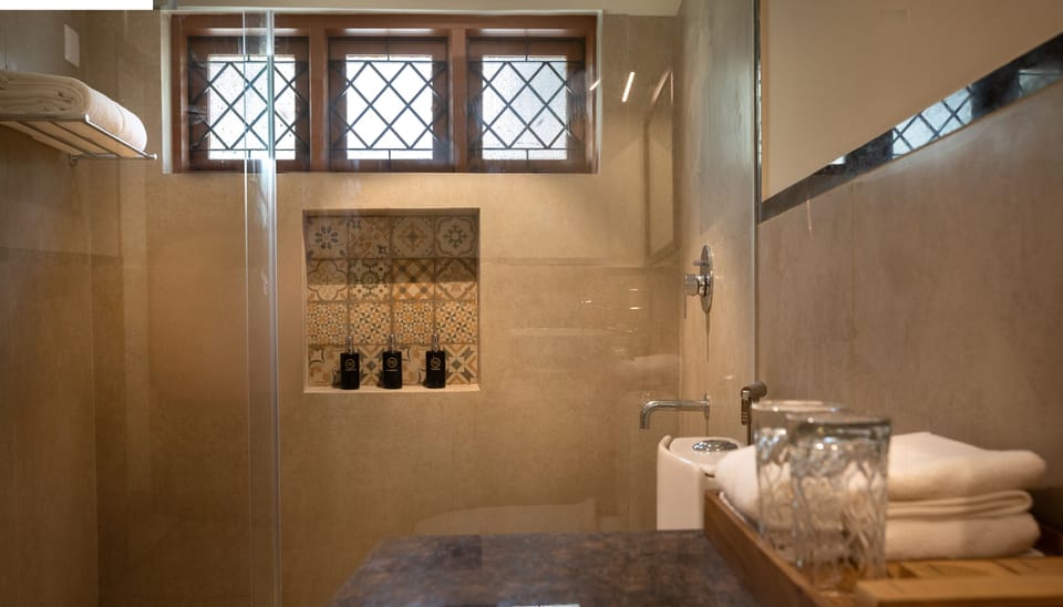 Standard Double Room, Balcony, Garden View | Bathroom | Shower, hair dryer, bathrobes, slippers