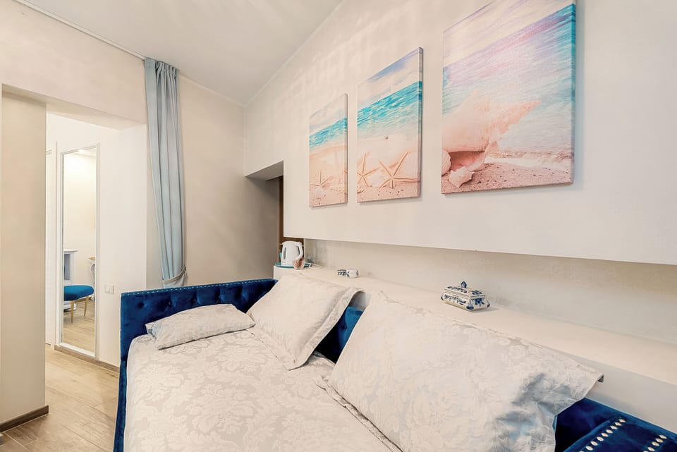 Deluxe Triple Room, Pool View | Egyptian cotton sheets, premium bedding, memory foam beds, in-room safe