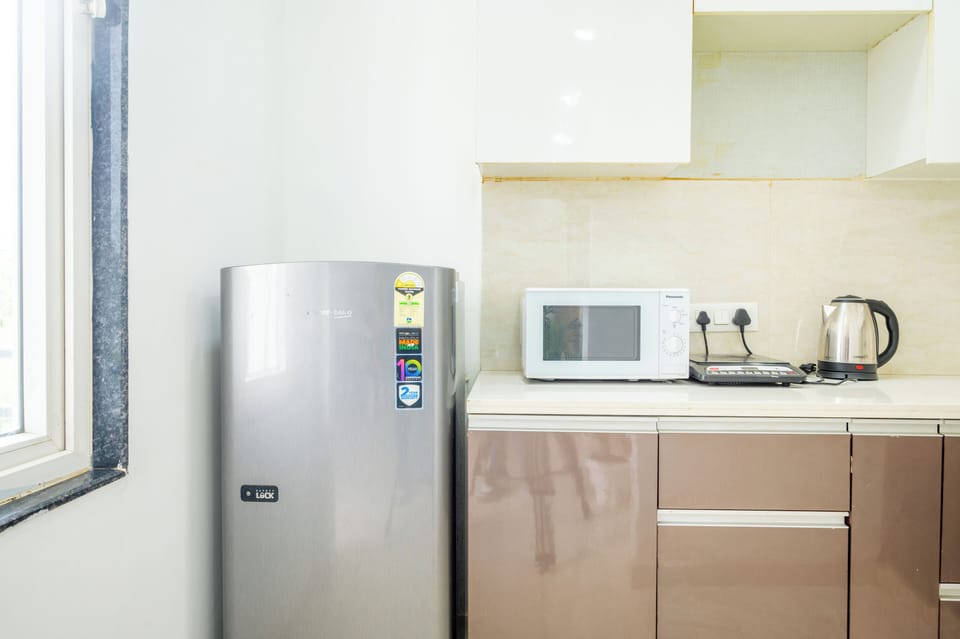 Studio, City View | Private kitchenette | Fridge, microwave, oven, dishwasher