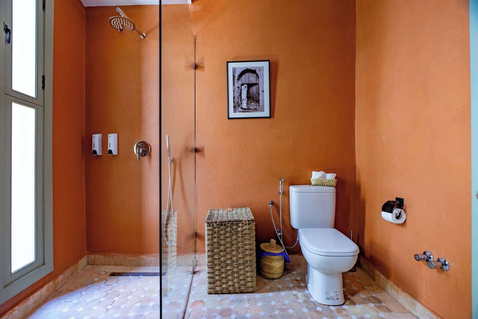 Shower, slippers, towels, soap