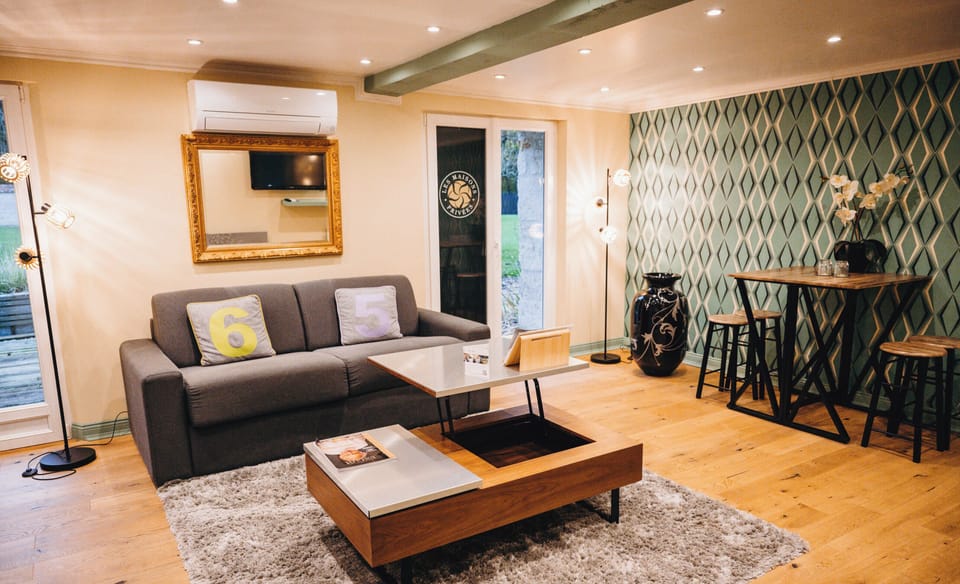 Family Quadruple Room | Living area | 55-inch LCD TV with satellite channels, Netflix, streaming services