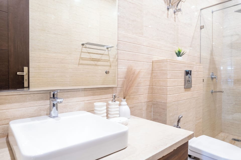 Studio, City View | Bathroom | Shower, free toiletries, slippers, towels