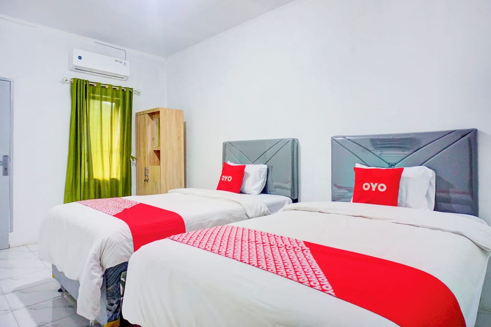 Deluxe Twin Room | Desk, WiFi (free), bed sheets