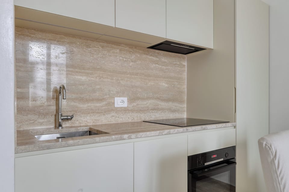 Apartment, 1 Double Bed with Sofa bed | Private kitchen | Electric kettle, dining tables