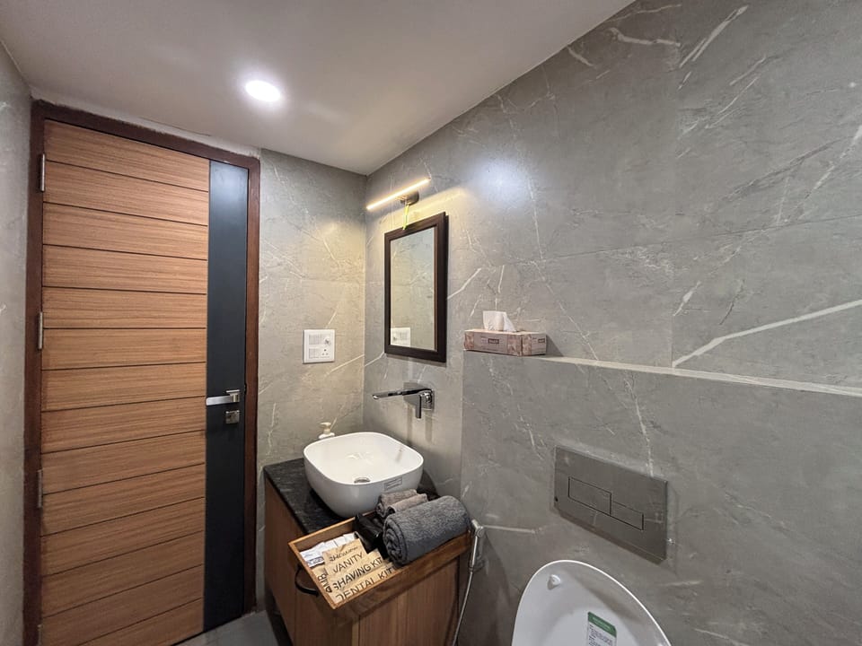 Studio, City View | Bathroom | Shower, free toiletries, slippers, bidet