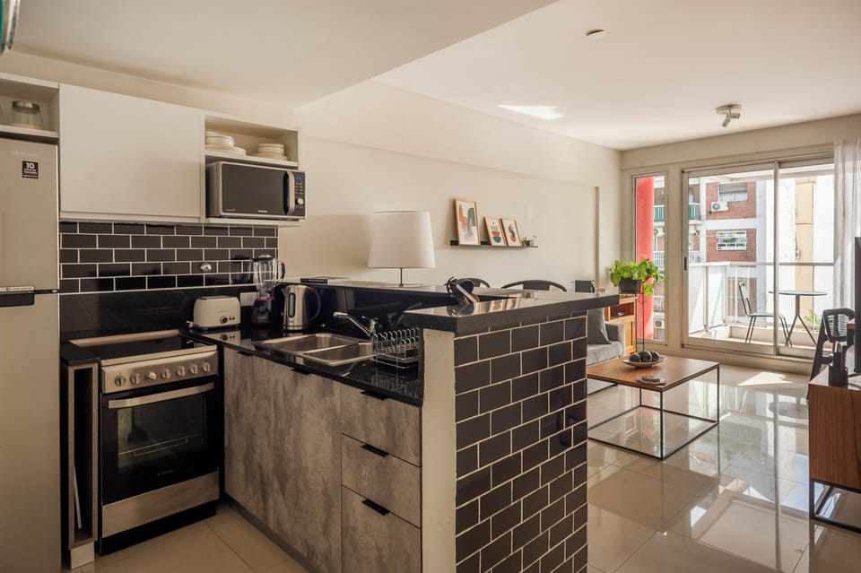 Comfort Apartment, City View | Private kitchen | Microwave, oven, stovetop, coffee/tea maker