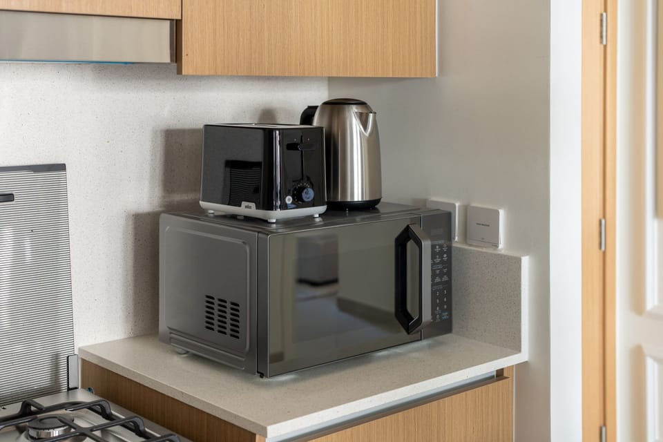 Luxury Apartment, 1 Bedroom, Pool View | Private kitchen | Coffee/tea maker, electric kettle, toaster