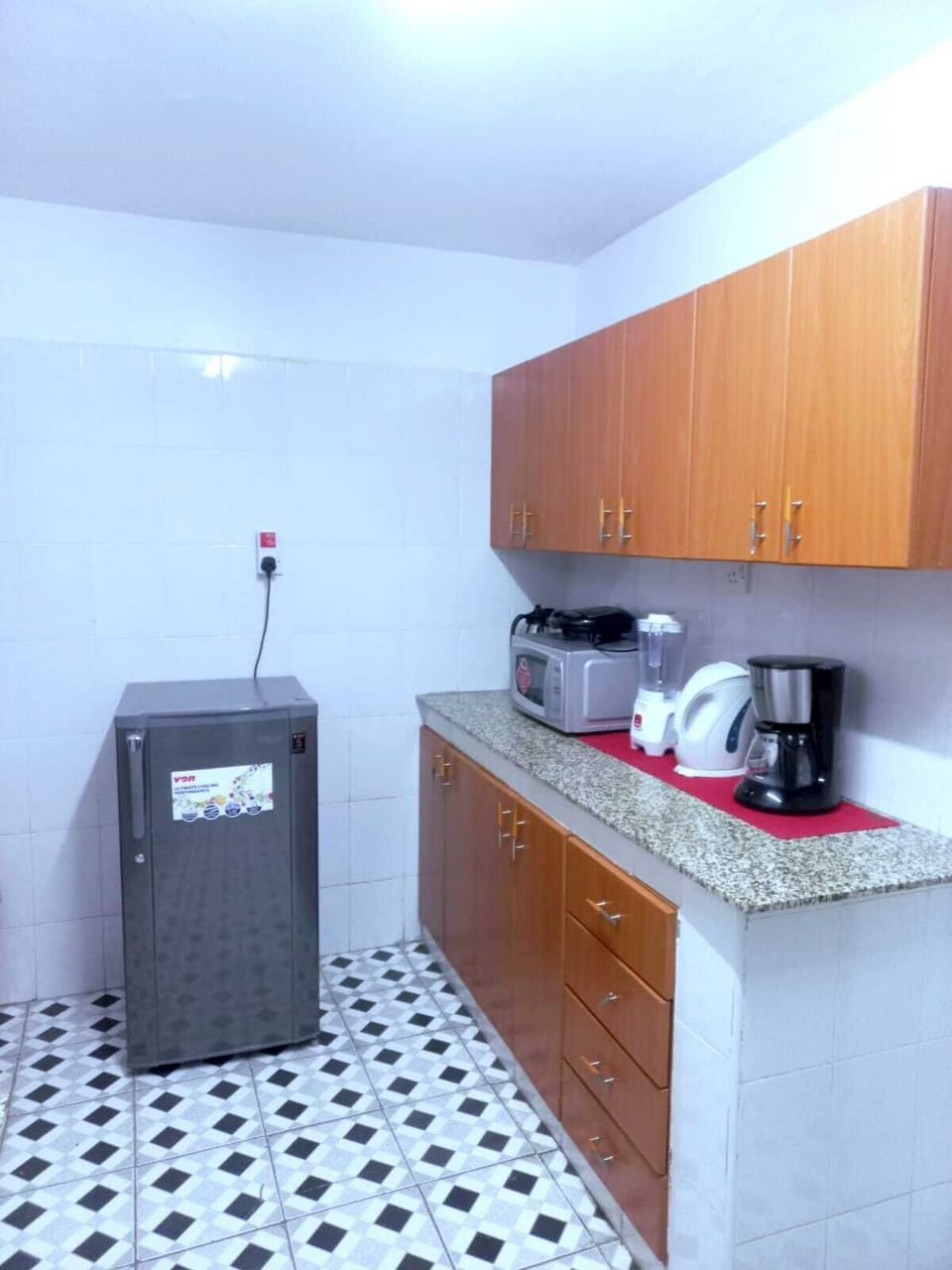 Deluxe Apartment, City View | Private kitchen | Fridge, microwave, cookware/dishes/utensils