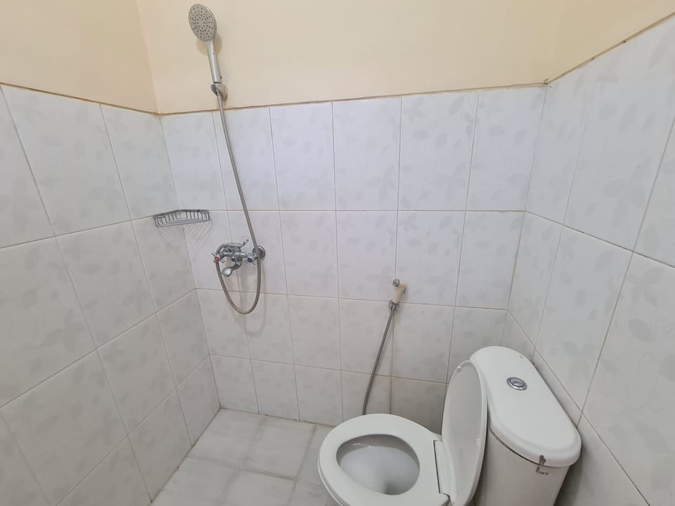 Standard Double Room | Bathroom | Shower, towels, soap