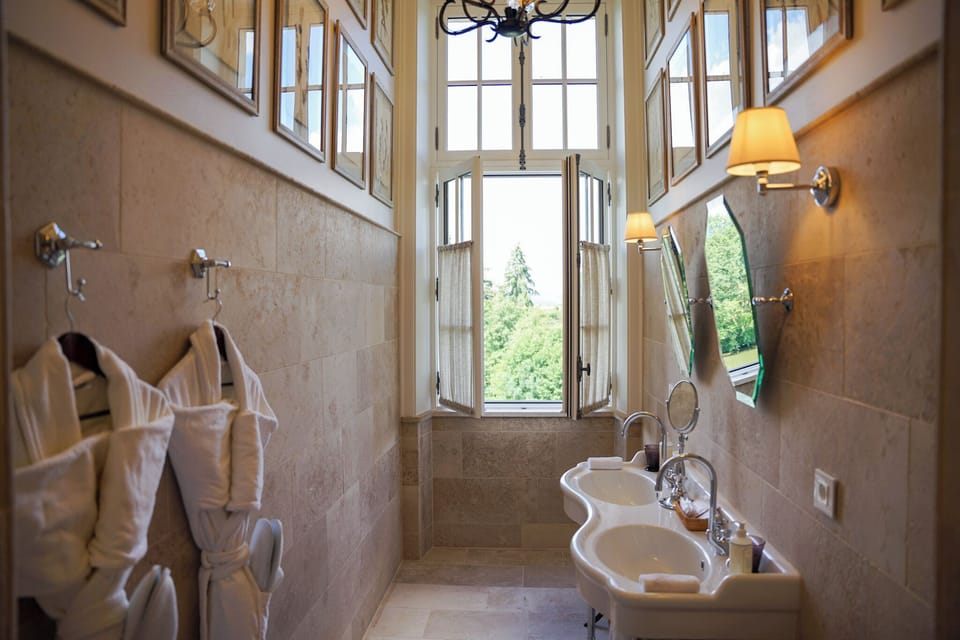 Signature Room | Bathroom | Free toiletries, hair dryer, bathrobes, slippers