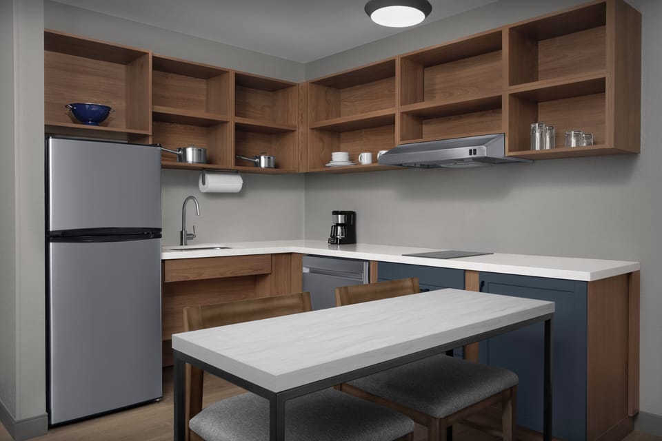 Desk, laptop workspace, blackout drapes, iron/ironing board