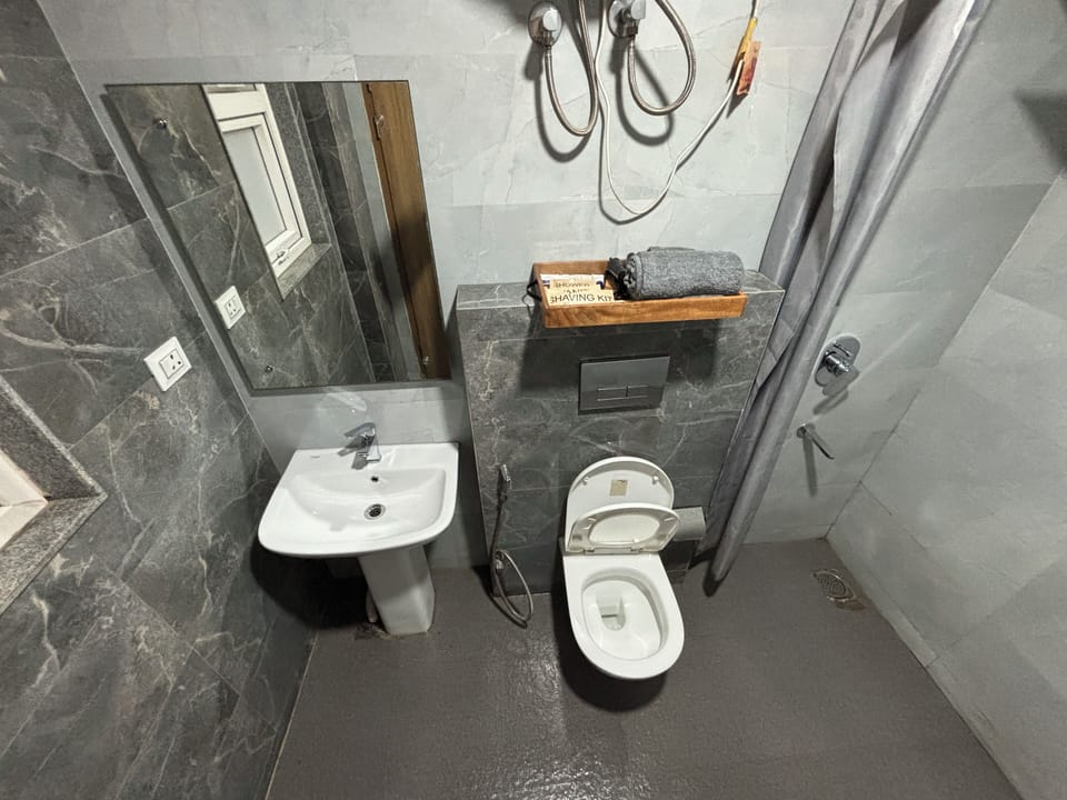 Studio, City View | Bathroom | Shower, free toiletries, slippers, towels