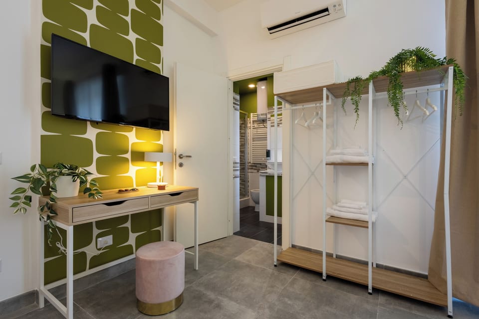 Family Triple Room (Lime Suite) | Desk, blackout drapes, WiFi (free), bed sheets