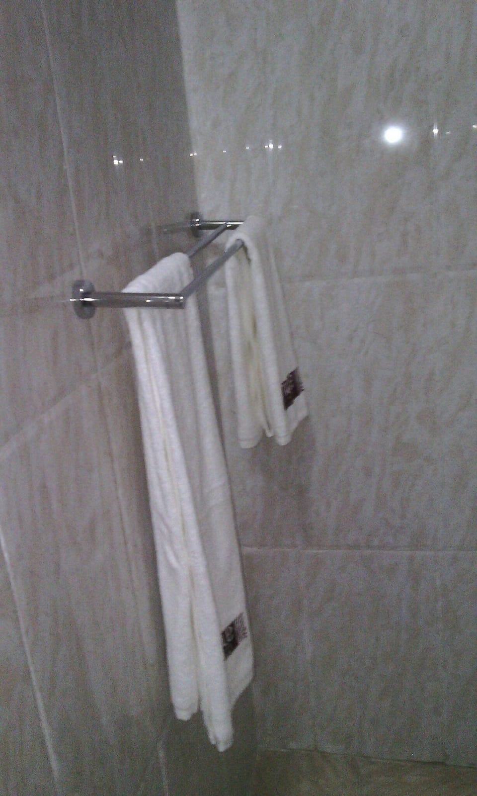 Shower, free toiletries, slippers, towels