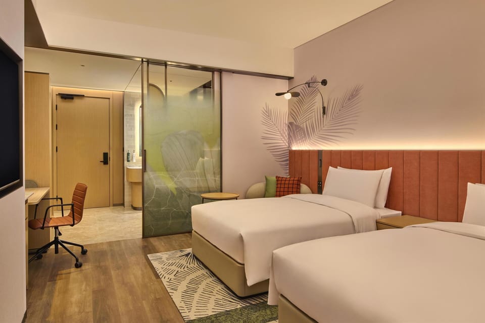 Basic Room, 2 Twin Beds | Down comforters, minibar (free items), desk, laptop workspace