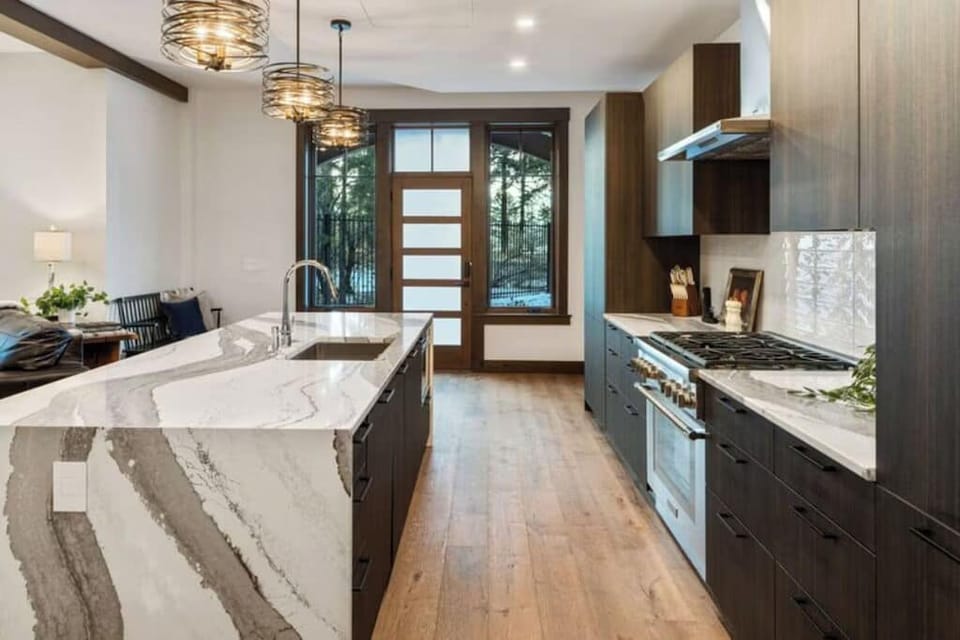 Luxury Condo, Kitchen, Partial Lake View | Private kitchen | Full-size fridge, microwave, oven, stovetop