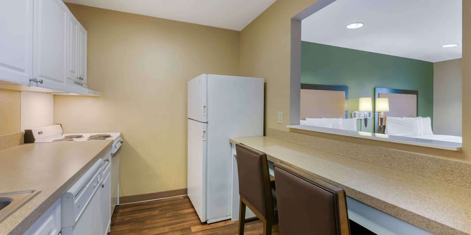 Deluxe Studio, Multiple Beds, Non Smoking | Private kitchen | Full-size fridge, microwave, stovetop, dishwasher