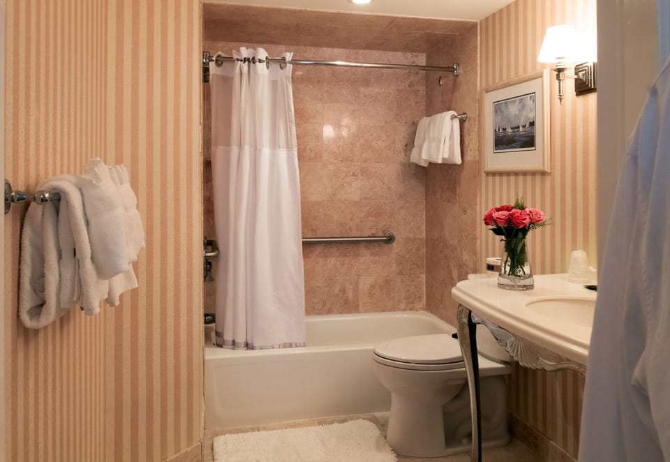 Superior Room, 1 King Bed | Bathroom | Combined shower/tub, deep soaking tub, designer toiletries, hair dryer