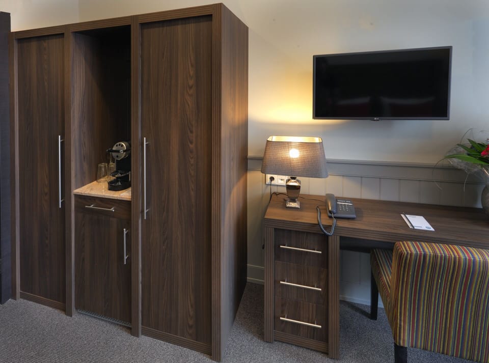Premium bedding, down comforters, pillowtop beds, minibar