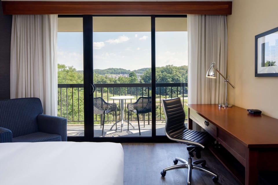 Room, 2 Queen Beds, Balcony | In-room safe, desk, laptop workspace, blackout drapes