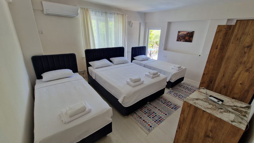 Premium bedding, Select Comfort beds, laptop workspace, bed sheets