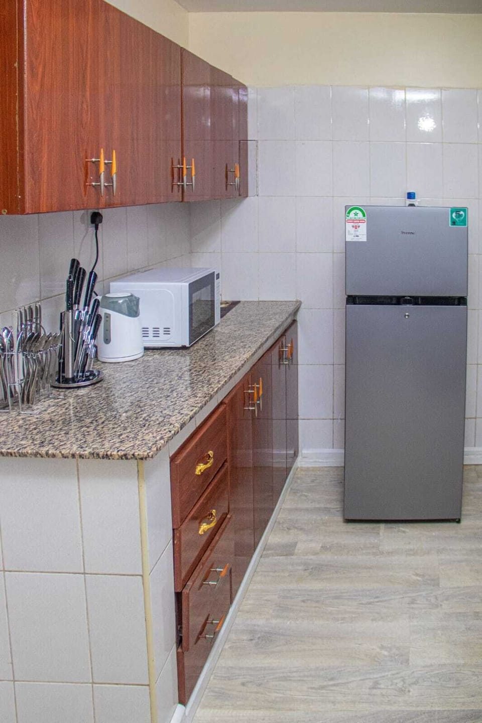 Comfort Apartment, City View | Private kitchen | Fridge, microwave, cookware/dishes/utensils