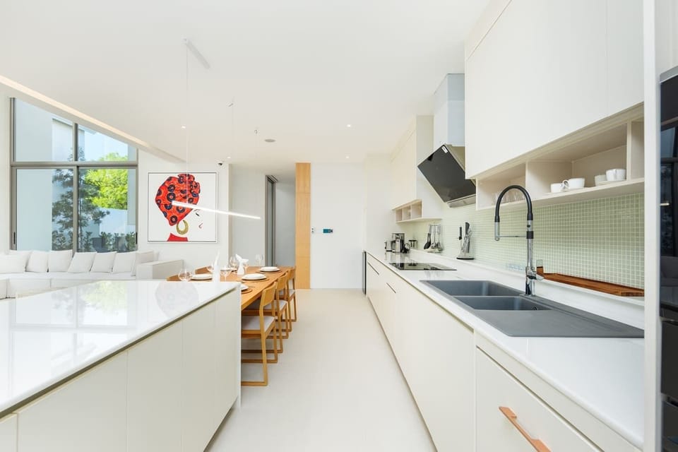 Villa, 3 Bedrooms, Lanai | Private kitchen | Electric kettle, dining tables, kitchen islands