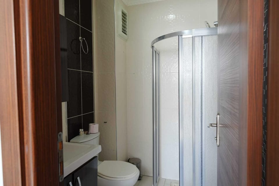 Shower, free toiletries, hair dryer, slippers