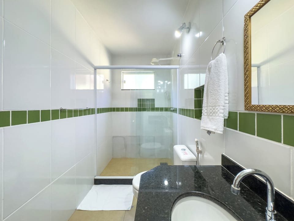 Standard Quadruple Room, Air conditioning | Bathroom | Shower, hair dryer, towels