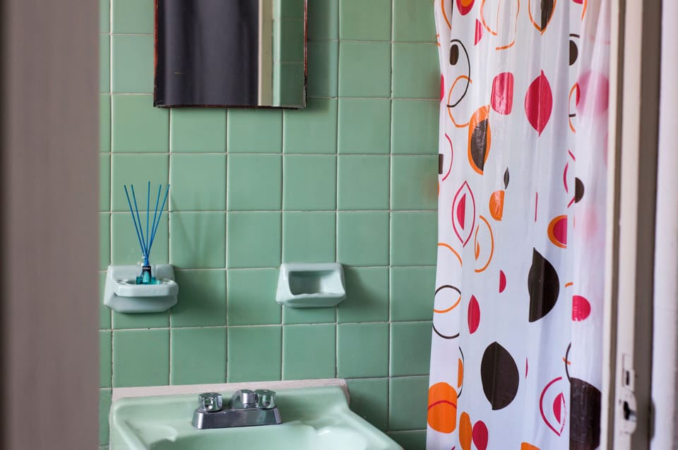 Standard Room | Bathroom | Shower, towels, toilet paper