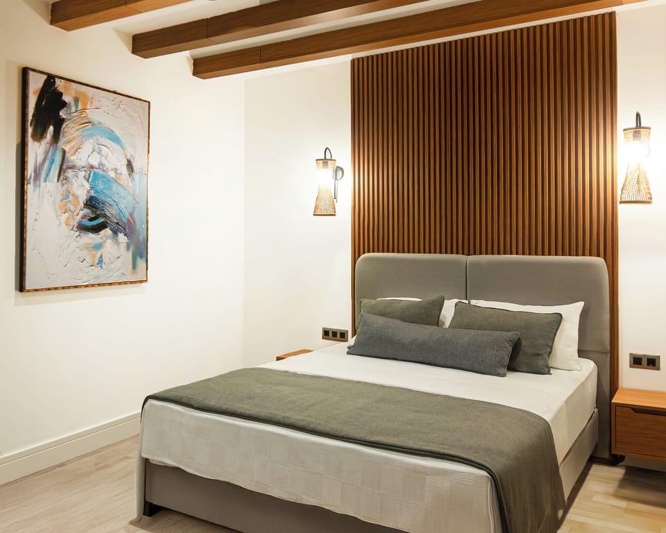 Frette Italian sheets, premium bedding, minibar, laptop workspace