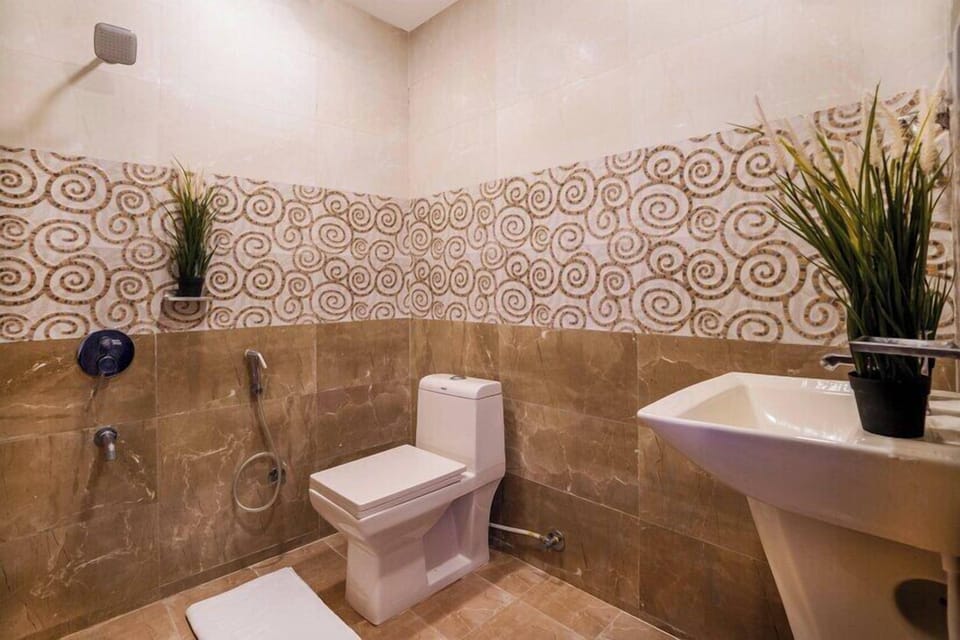 Shower, free toiletries, hair dryer, slippers
