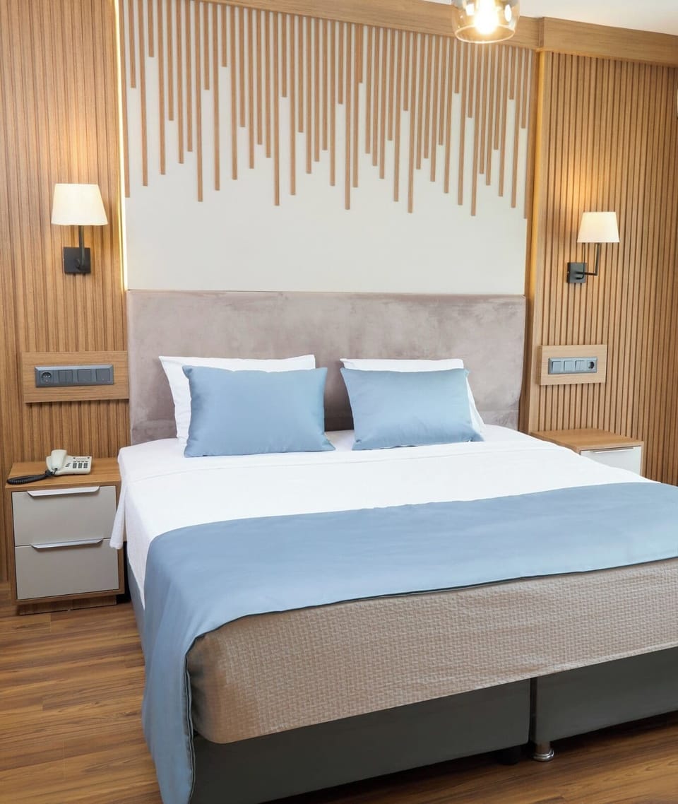 Premium bedding, desk, laptop workspace, soundproofing