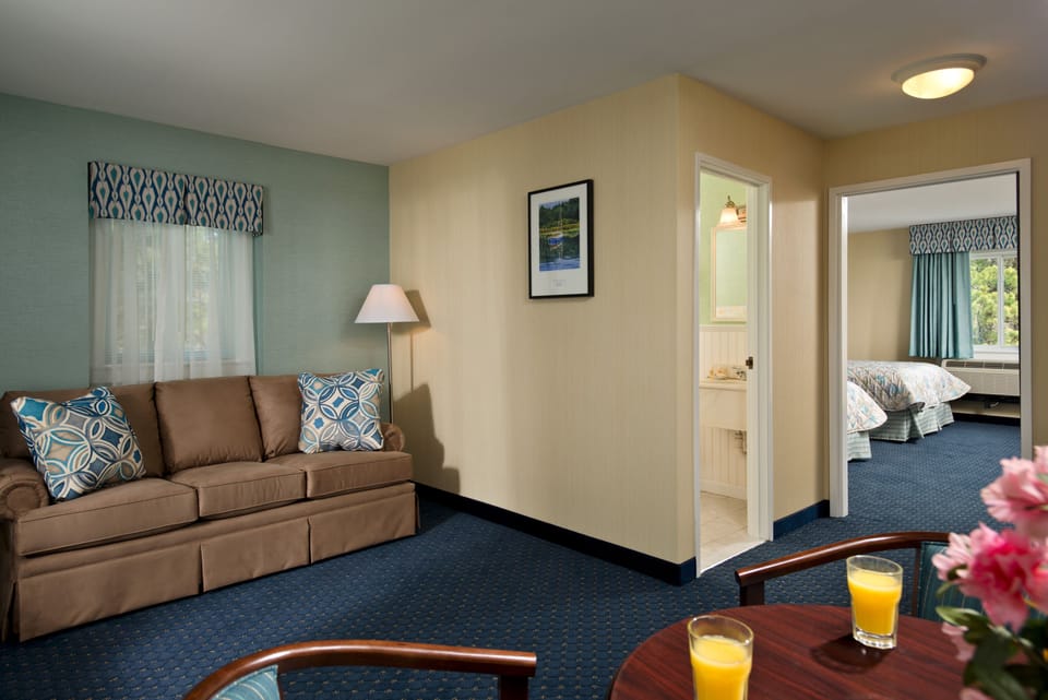 Suite, 2 Queen Beds | Iron/ironing board, WiFi (free), bed sheets