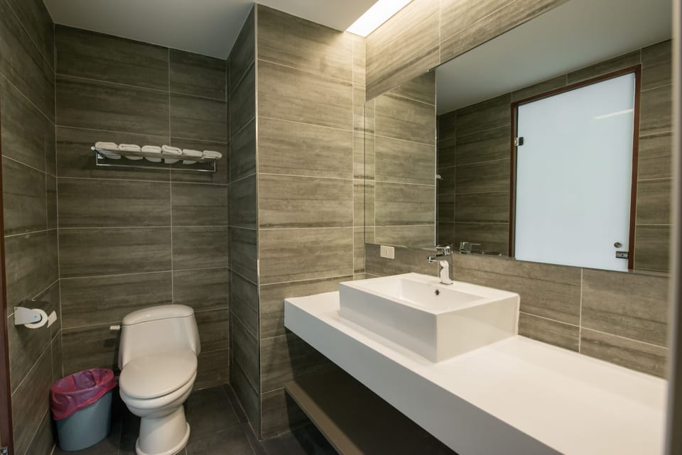 Family Room, Balcony | Bathroom | Shower, free toiletries, hair dryer, slippers