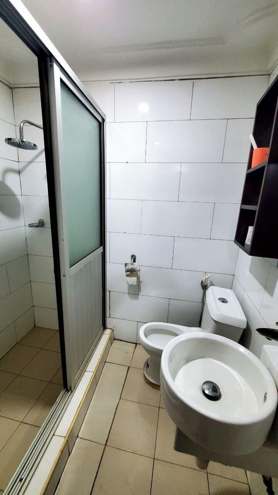 Shower, slippers, bidet, towels