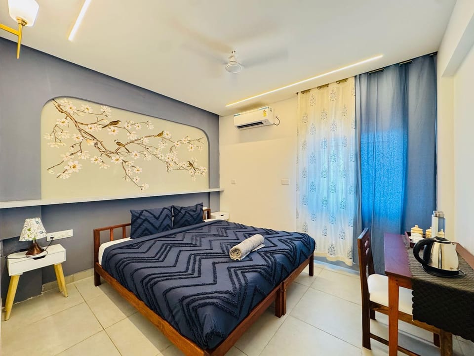 Deluxe Double Room, Garden View | Desk, free WiFi