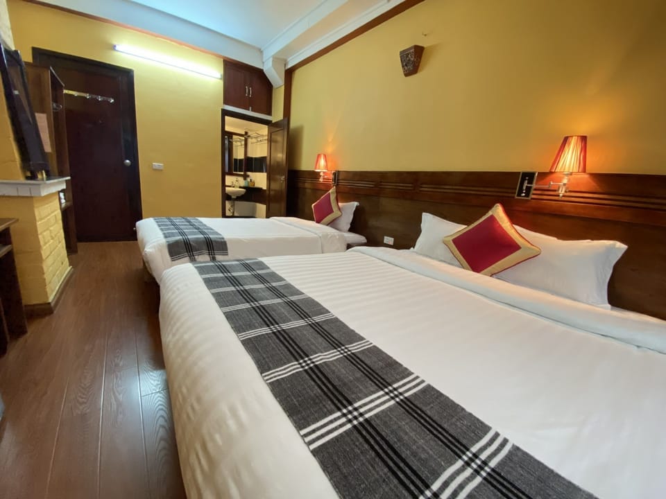Family Room | Free minibar, desk, rollaway beds, free WiFi