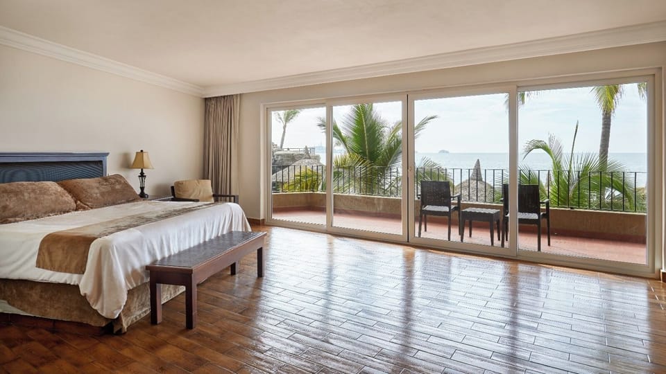 Habitación 1 cama King size todo incluido | Premium bedding, in-room safe, iron/ironing board, free WiFi