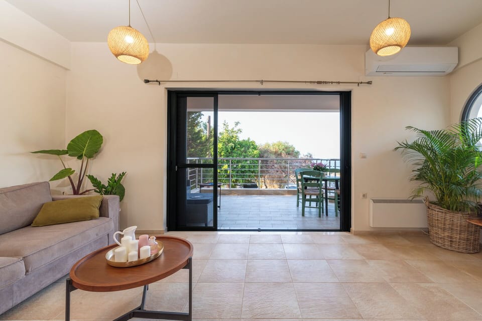 Superior Villa, Sea View | Living area | Flat-screen TV