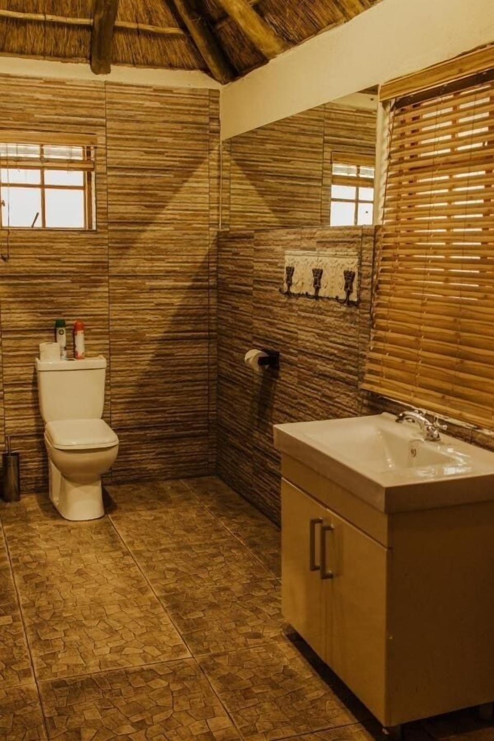 Deluxe Room | Bathroom | Towels, soap, toilet paper