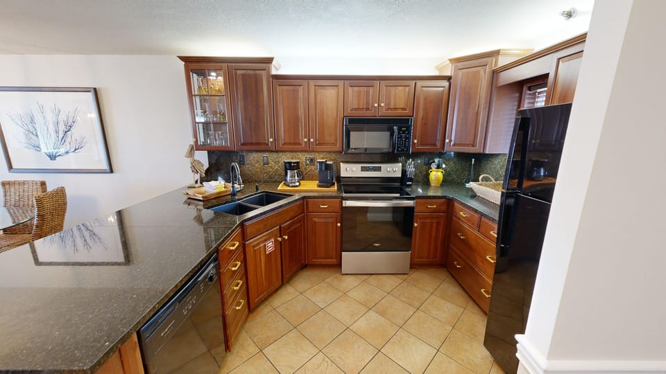 Condo, 2 Bedrooms | Private kitchen | Coffee/tea maker, fridge, oven, toaster