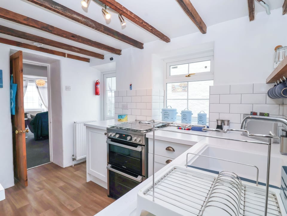Fridge, microwave, toaster, cookware/dishes/utensils