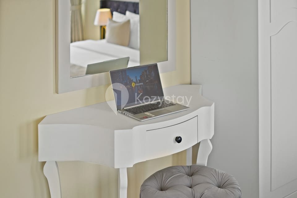 Apartment, 3 Bedrooms, City View | Laptop workspace, iron/ironing board, free WiFi