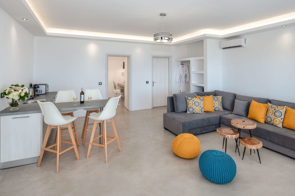 Superior Suite, 1 Bedroom | Living area | 24-inch LED TV with satellite channels, TV