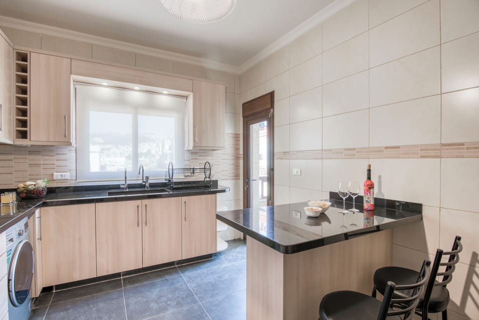 Apartment, 3 Bedrooms, Kitchen, City View | Private kitchen | Full-size fridge, microwave, oven, stovetop