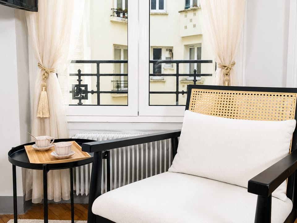 Standard Apartment, Courtyard View | Living area | 80-cm Smart TV with digital channels
